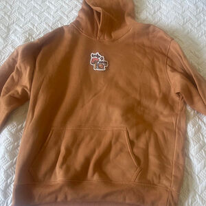 Tan hoodie with mushroom patch that says take it easy 😎